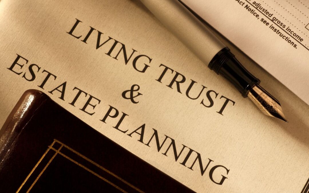 Image of a document and a pen, tucked inside a folder, saying living will and estate planning